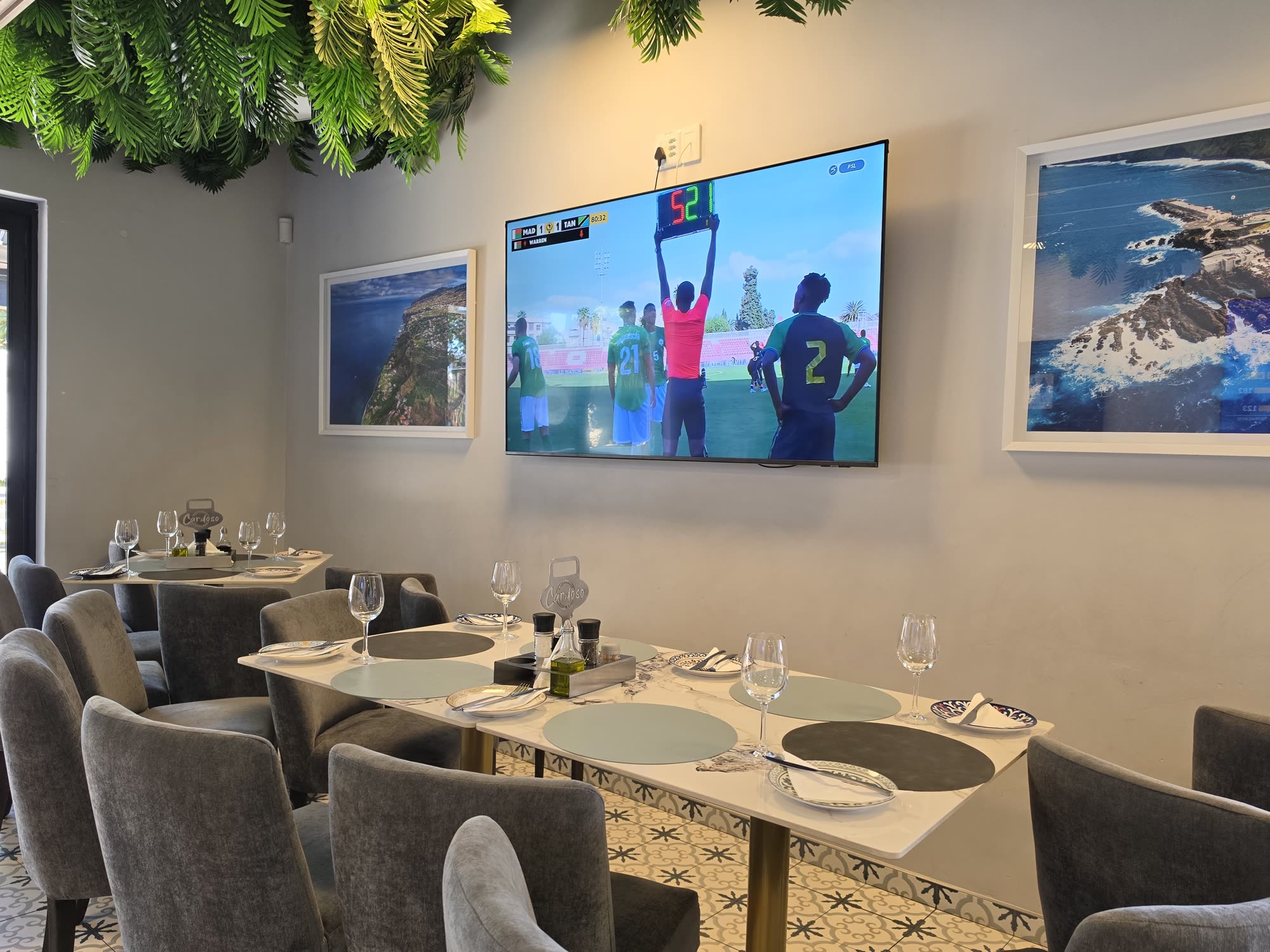 Dining with the big screens on