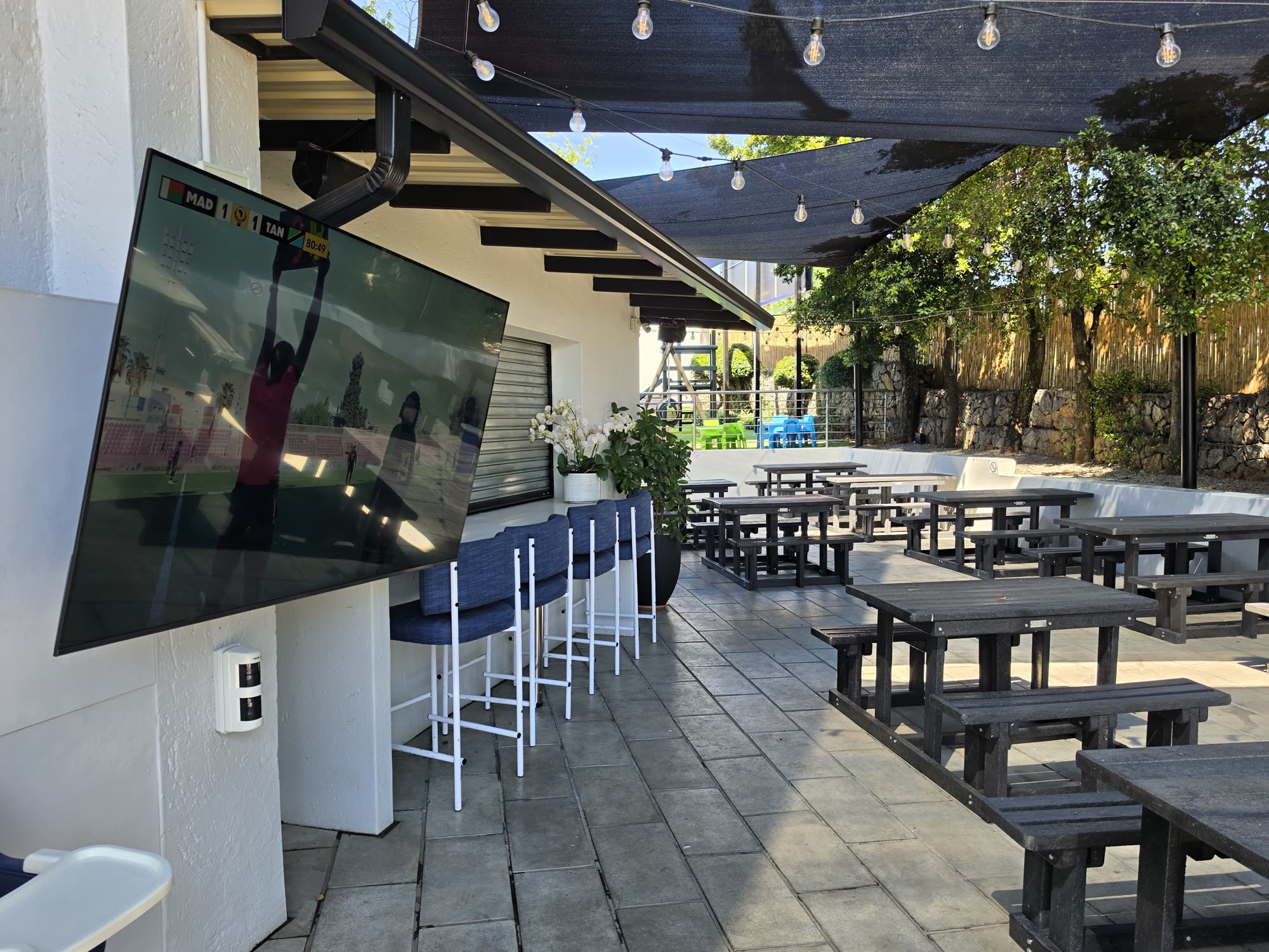 The terrace, with the game on